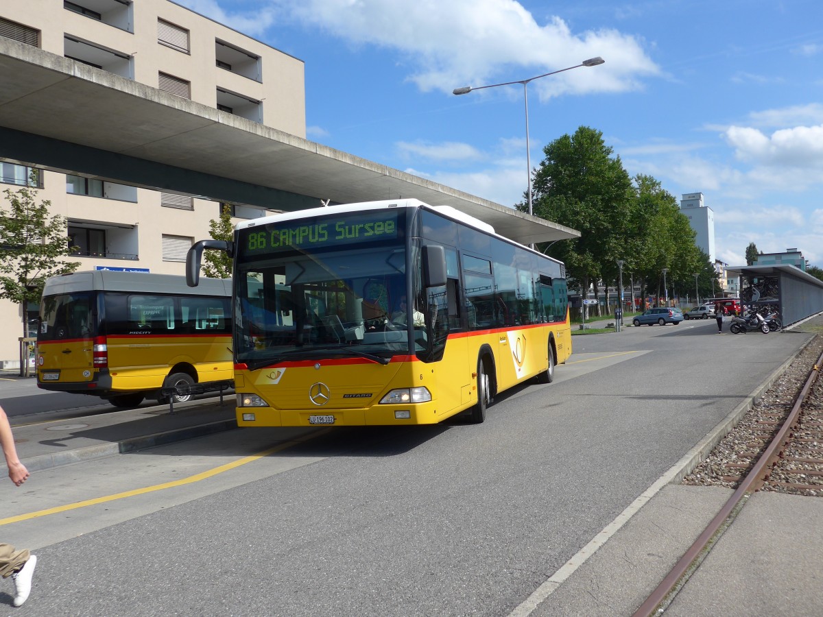 (154'631) - Hfliger, Sursee - Nr. 6/LU 196'102 - Mercedes am 30. August 2014 beim Bahnhof Sursee