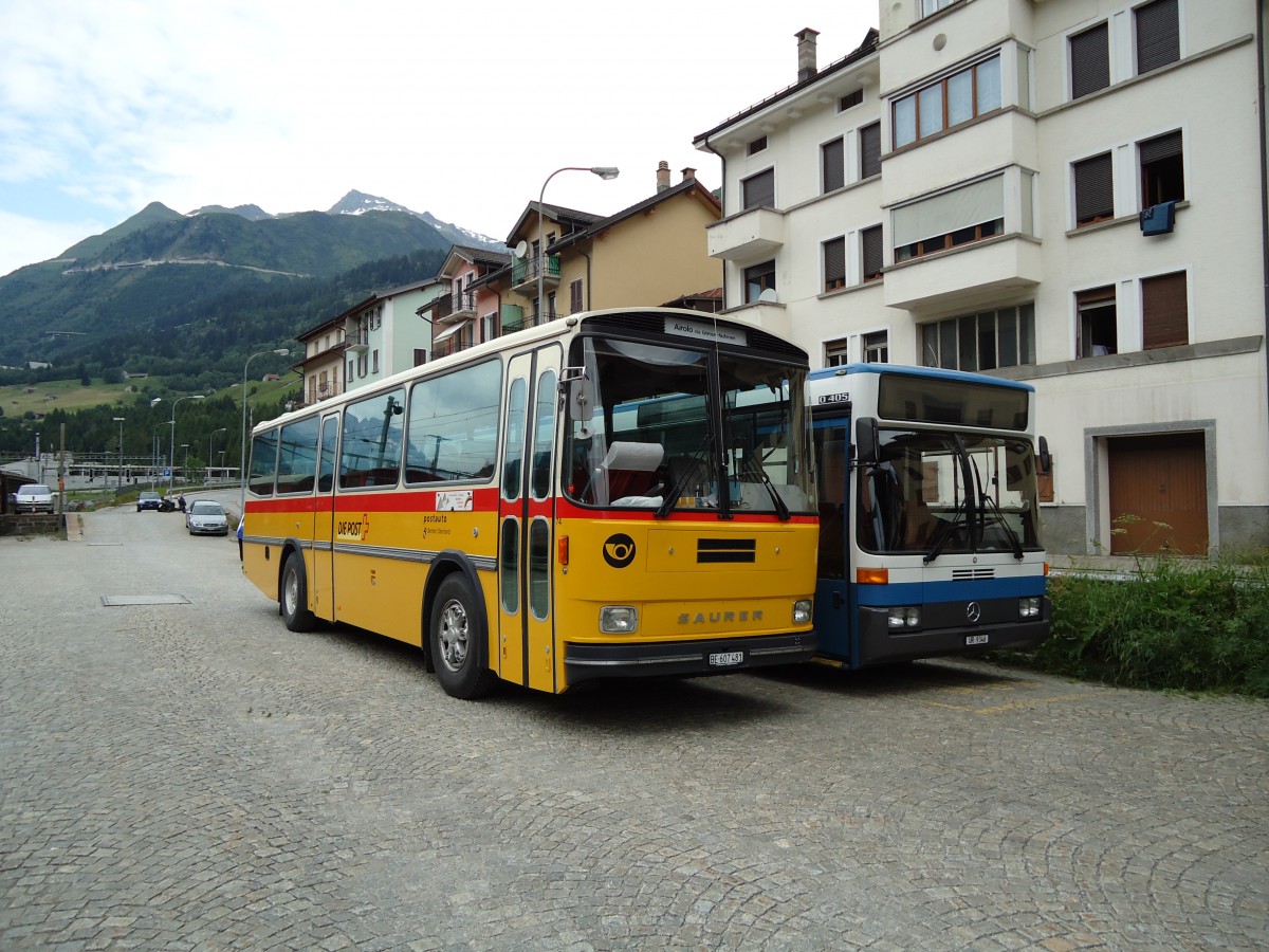 (157'562) - AVG Meiringen - Nr. 74/BE 607'481 - Saurer/R&J (ex P 24'357) am 4. Juli 2010 beim Bahnhof Airolo