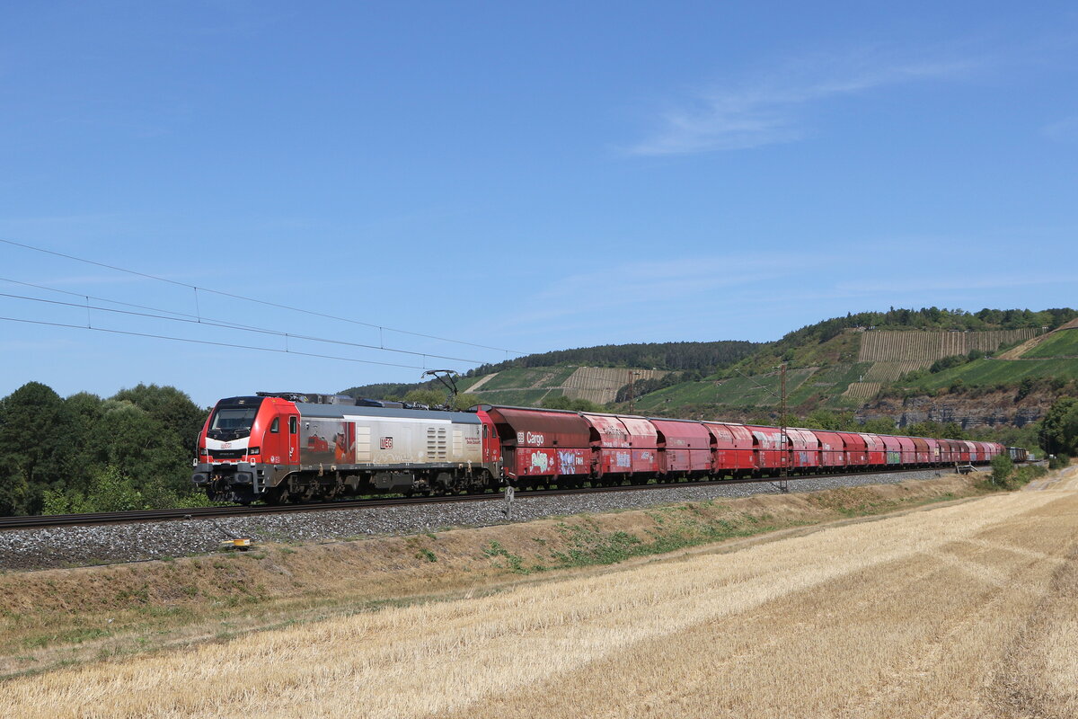 159 229 von  MEG  mit Schttgutwagen am 8. August 2022 bei Himmelstadt im Maintal.