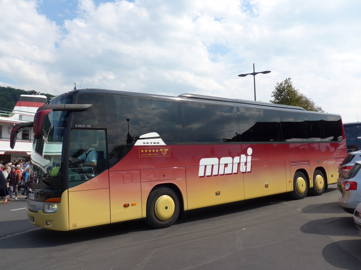 (164'560) - Marti, Kallnach - Nr. 12/BE 572'212 - Setra am 10. September 2015 beim Bahnhof Thun