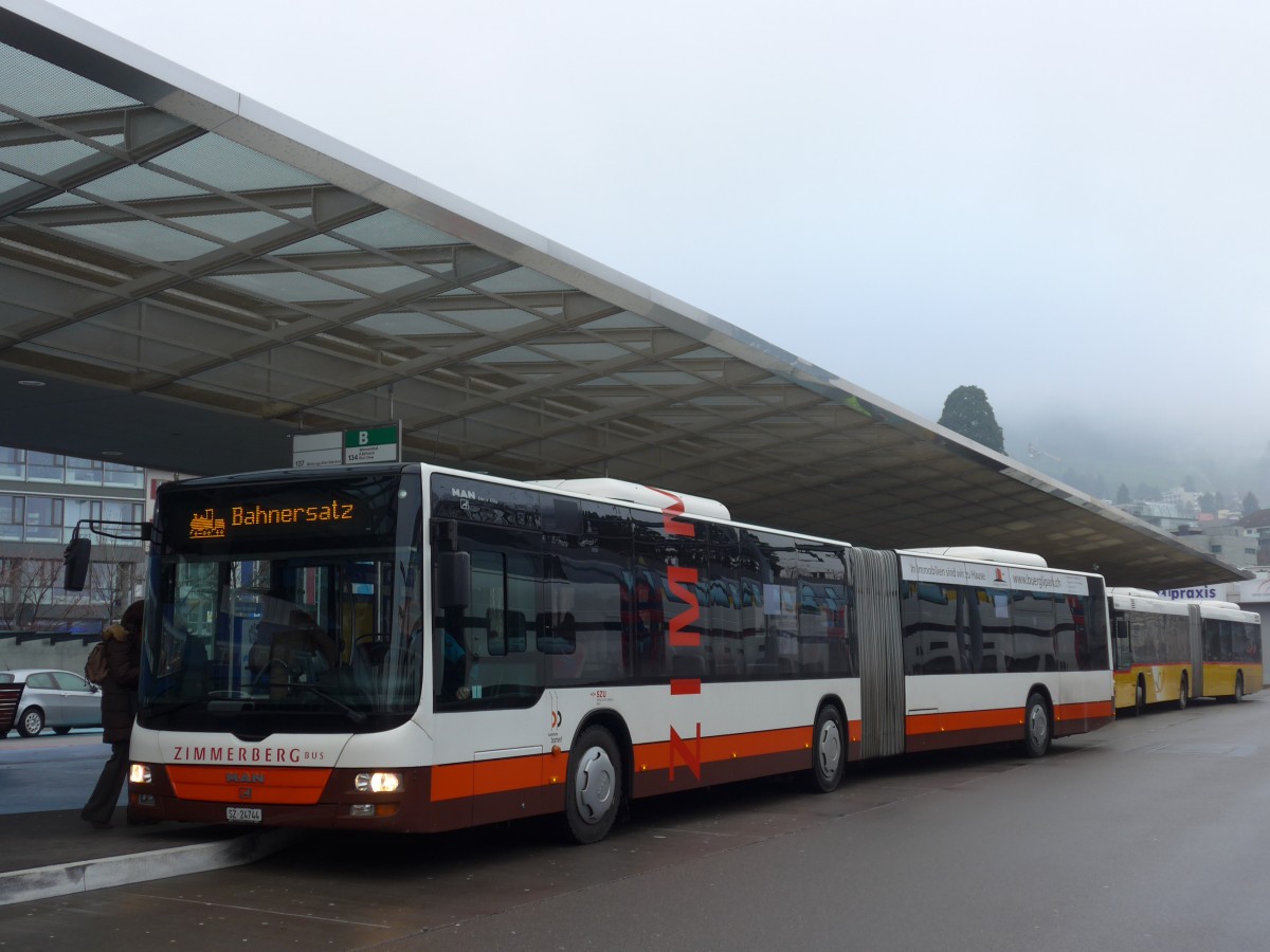 (168'186) - Bamert, Wollerau - SZ 24'744 - MAN (ex Vorfhrfahrzeug) am 1. Januar 2016 beim Bahnhof Horgen