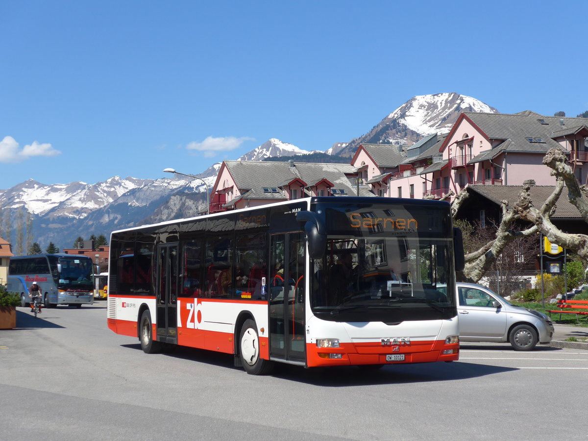 (169'824) - Dillier, Sarnen - Nr. 11/OW 10'121 - MAN am 11. April 2016 beim Bahnhof Meiringen