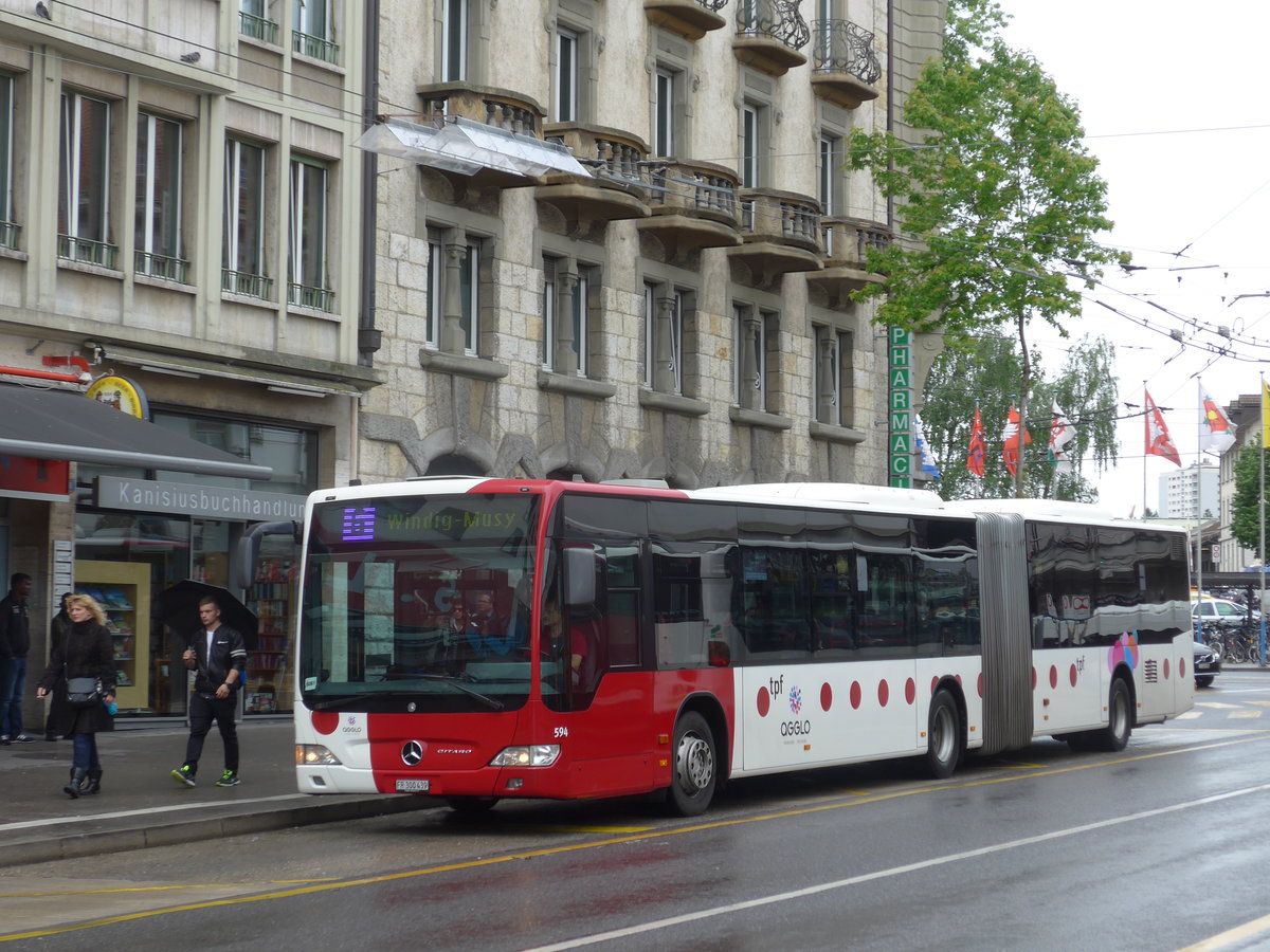 (171'781) - TPF Fribourg - Nr. 594/FR 300'439 - Mercedes am 13. Juni 2016 beim Bahnhof Fribourg