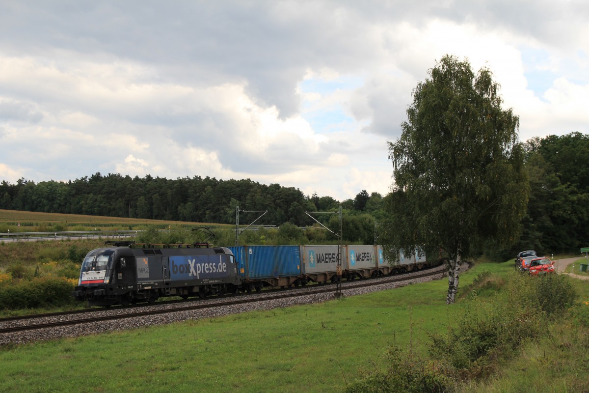 182 515-7 mit einem Containerzug am 30. August 2014 bei Sinngrn.