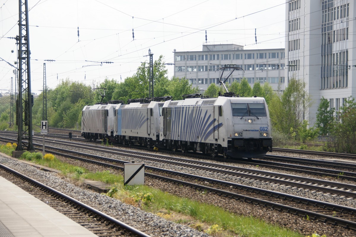 185 660, 186 102-2 und 185 662 durchfahren am 25. April 2011  den Heimeranplatz in Mnchen.