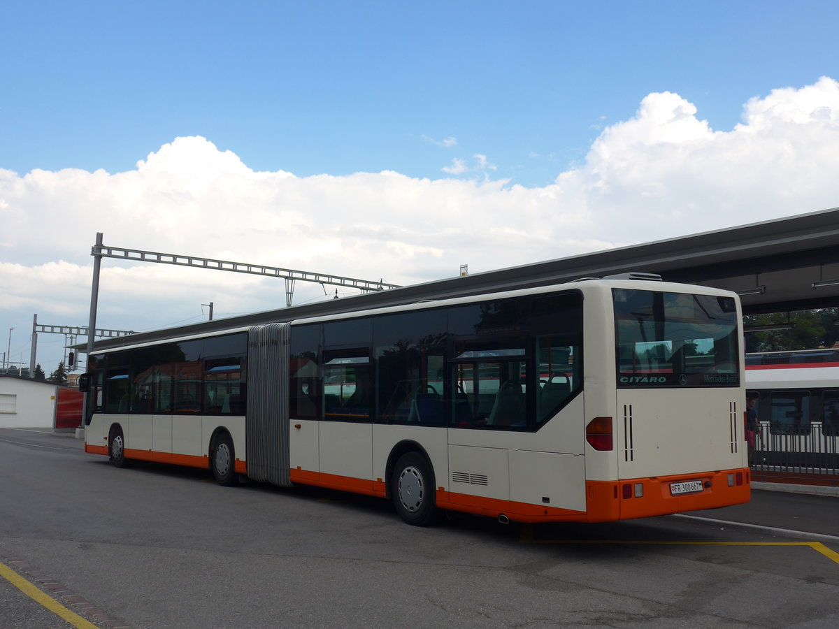 (195'334) - BSU Solothurn - Nr. 32/FR 300'667 - Mercedes (ex RBS Worblaufen Nr. 77) am 31. Juli 2018 beim Bahnhof Grolley (Einsatz Intertours)