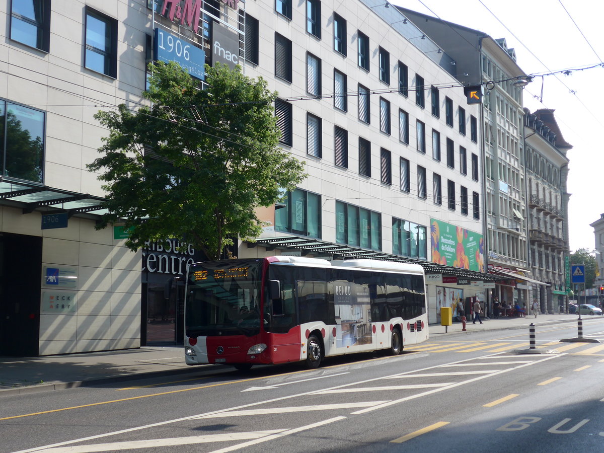 (195'626) - TPF Fribourg - Nr. 28/FR 300'282 - Mercedes am 5. August 2018 beim Bahnhof Fribourg