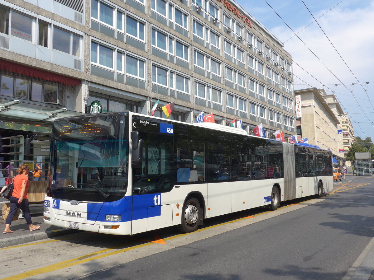 (195'751) - TL Lausanne - Nr. 658/VD 1653 - MAN am 6. August 2018 beim Bahnhof Lausanne