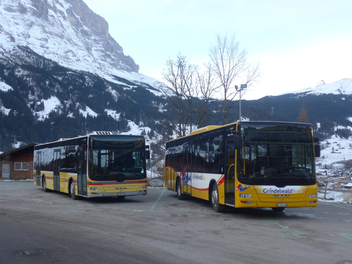 (213'150) - STI Thun - Nr. 129/BE 800'129 - MAN (Einsatz Grindelwald) + Grindelwaldbus, Grindelwald - Nr. 24/BE 364'408 - MAN/Gppel am 26. Dezember 2019 beim Bahnhof Grindelwald