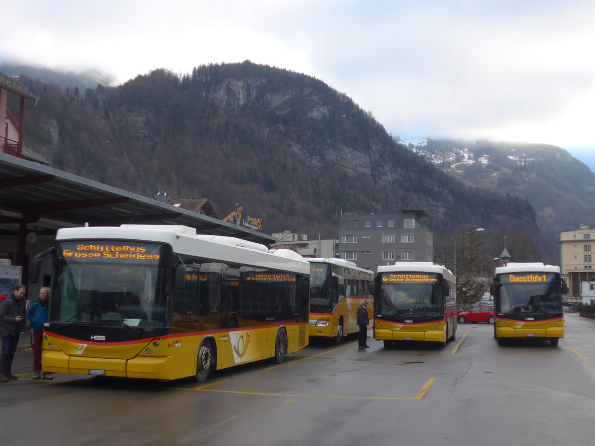 (213'390) - PostAuto Bern - BE 403'166 - Scania/Hess (ex AVG Meiringen Nr. 66; ex Steiner, Messen) + BE 402'467 - Scania/Hess (ex AVG Meiringen Nr. 67; ex AVG Meiringen Nr. 76; ex Steiner, Messen) + BE 401'568 - Scania/Hess (ex AVG Meiringen Nr. 68; ex AVG Meiringen Nr. 59; ex Steiner, Messen) am 5. Januar 2020 in Meiringen, Postautostation