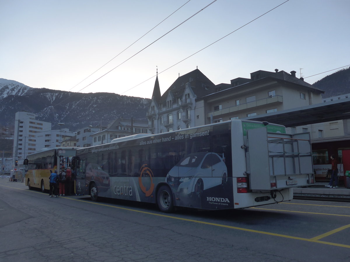 (214'122) - PostAuto Wallis - VS 449'120 - MAN am 9. Februar 2020 beim Bahnhof Brig