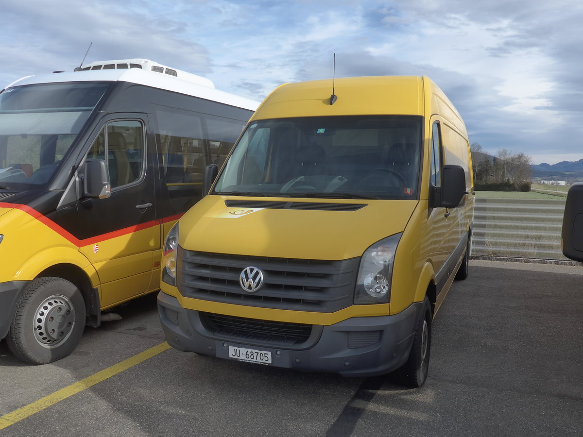 (214'302) - CarPostal Ouest - JU 68'705 - VW am 16. Februar 2020 in Develier, Parkplatz