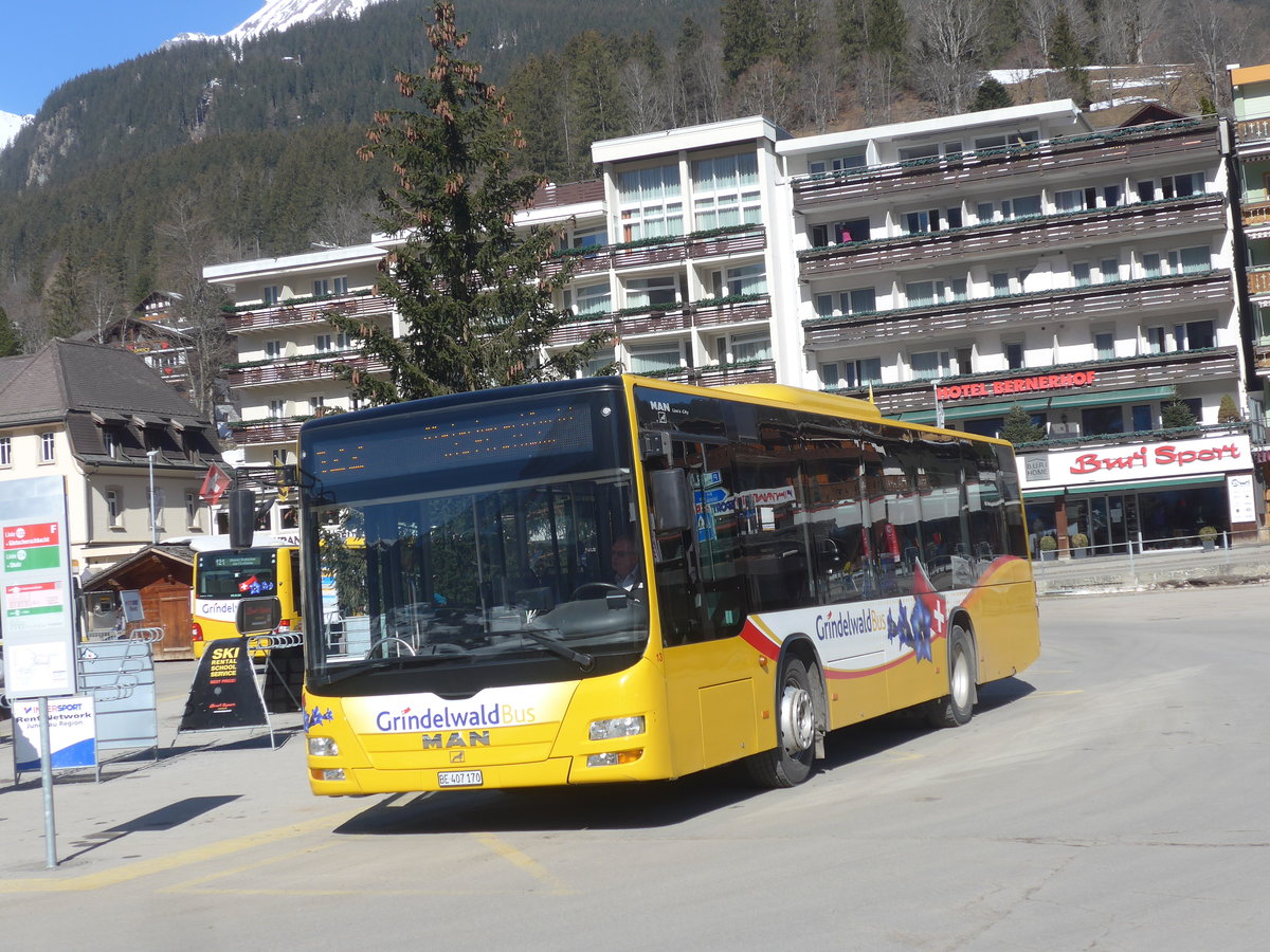 (223'865) - Grindelwaldbus, Grindelwald - Nr. 13/BE 407'170 - MAN/Gppel am 28. Februar 2021 beim Bahnhof Grindelwald
