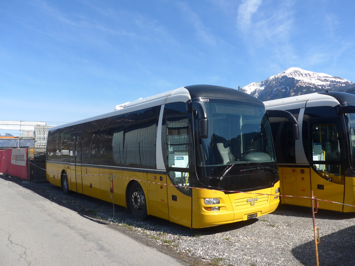 (224'506) - PostAuto Graubnden - (GR 162'981) - MAN am 28. Mrz 2021 in Landquart, Garage Bardill