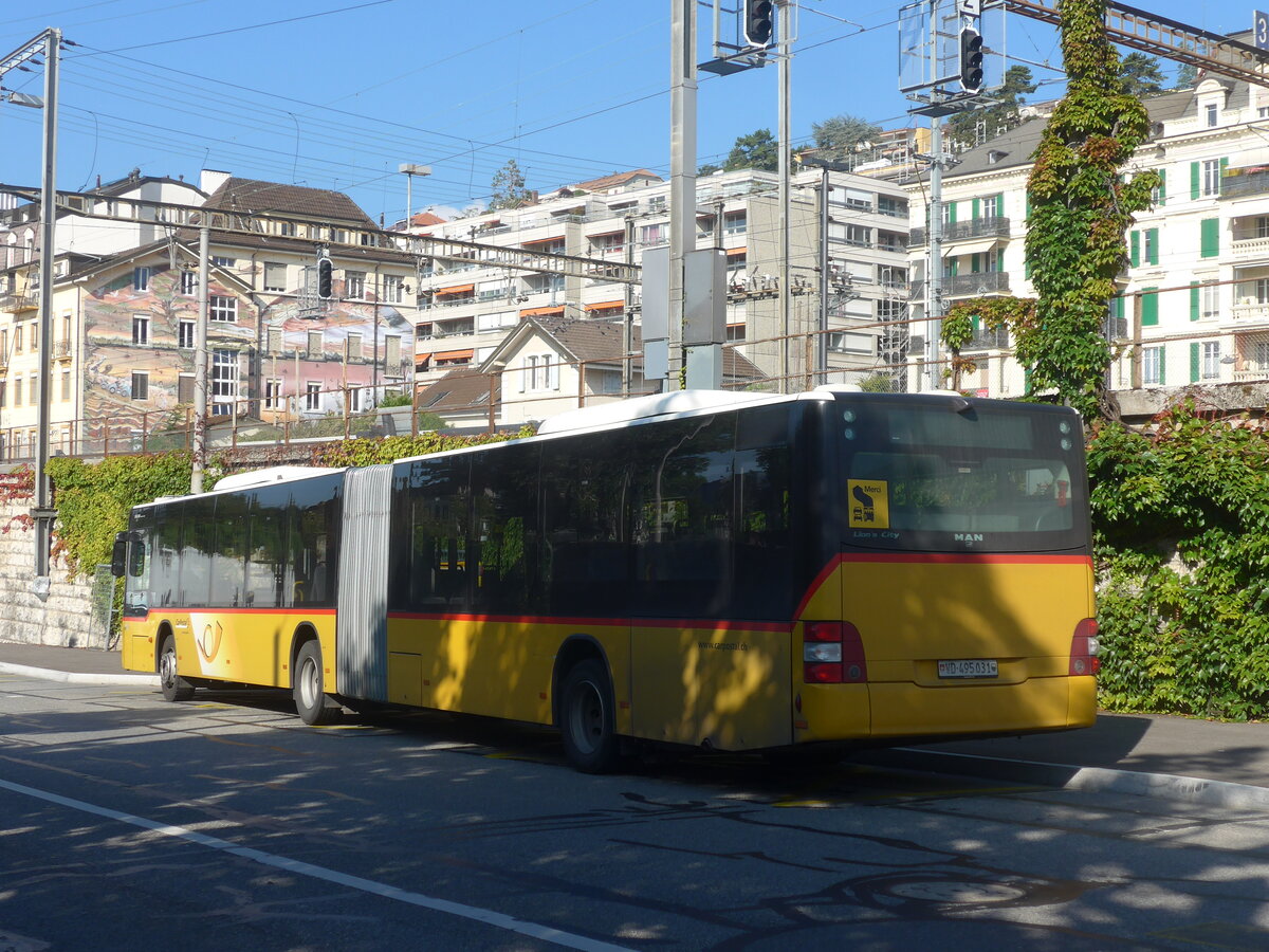 (228'073) - CarPostal Ouest - VD 495'031 - MAN am 18. September 2021 beim Bahnhof Neuchtel