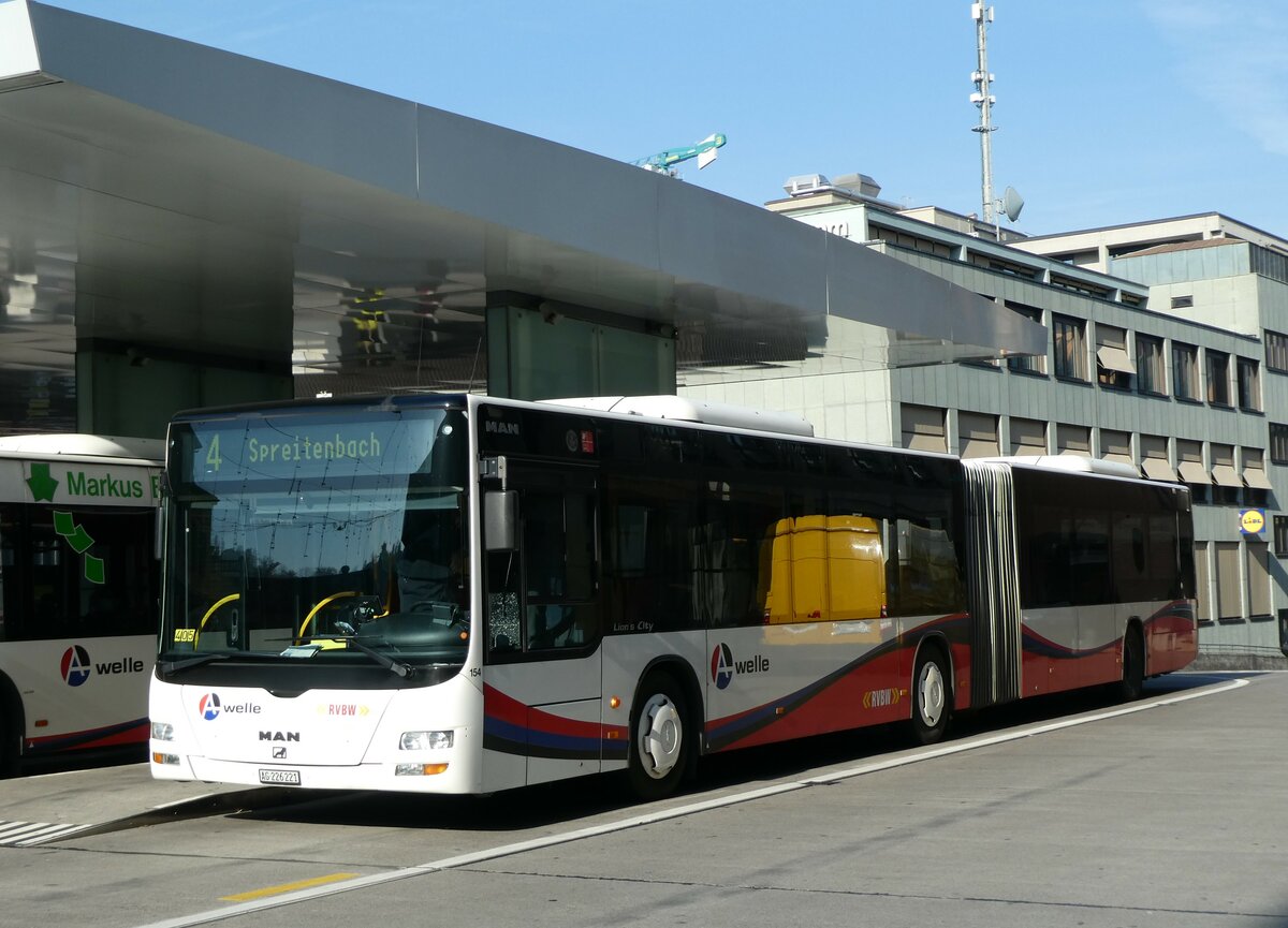 (230'483) - RVBW Wettingen - Nr. 154/AG 226'221 - MAN am 11. November 2021 beim Bahnhof Baden