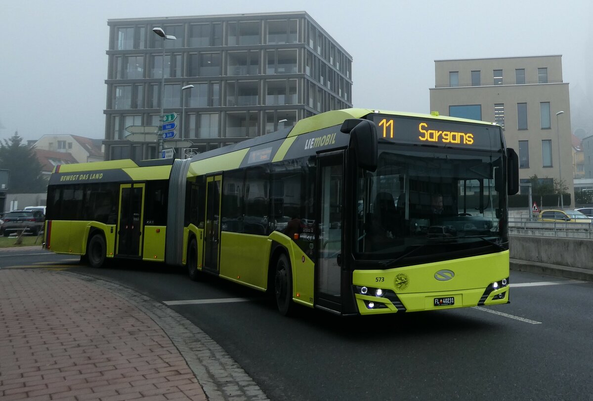 (231'317) - BOS PS Anstalt, Vaduz - Nr. 573/FL 40'231 - Solaris am 15. Dezember 2021 beim Bahnhof Schaan