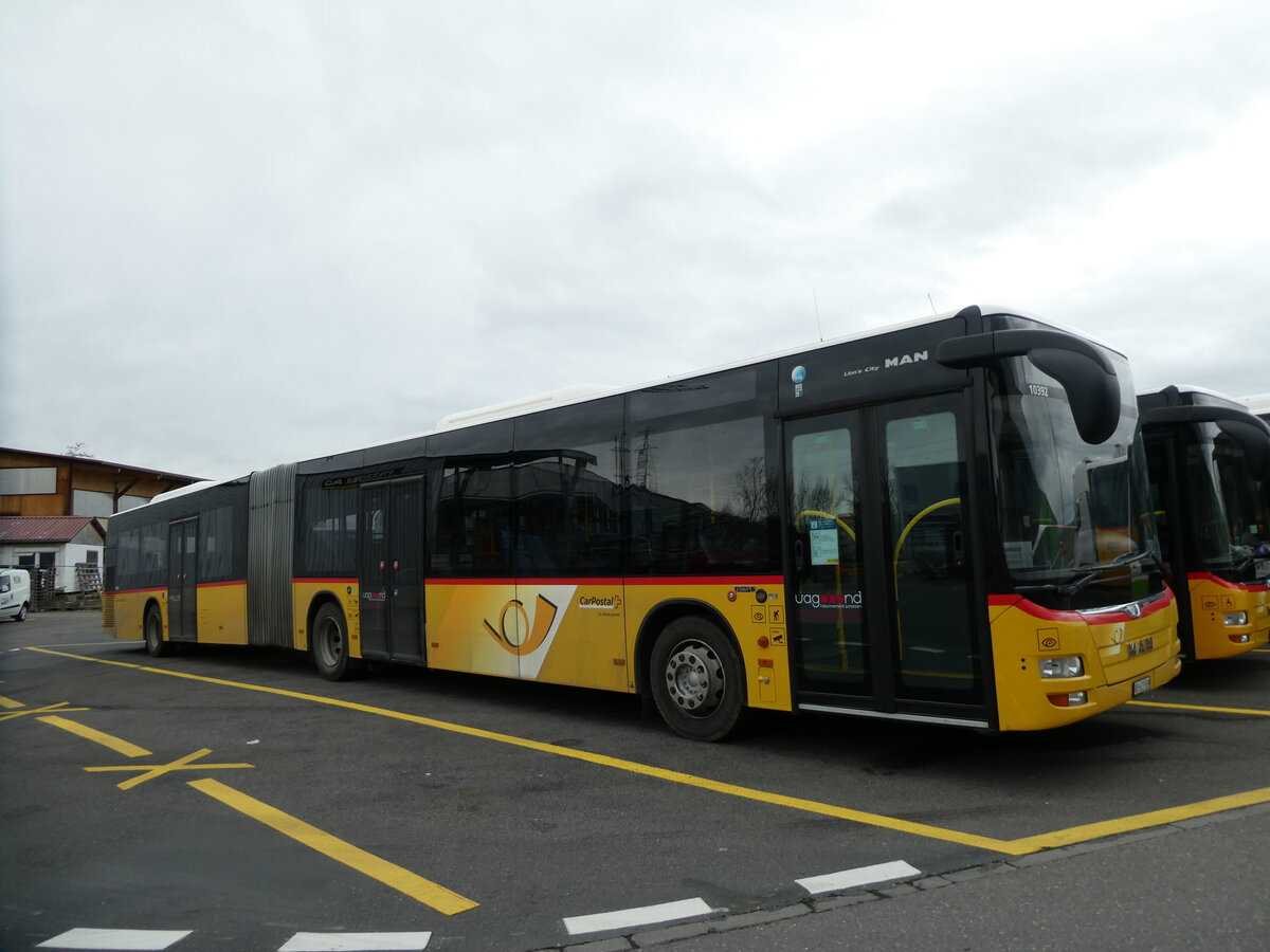 (232'717) - CarPostal Ouest - VD 623'509 - MAN (ex JU 52'077; ex Nr. 74) am 6. Februar 2022 in Kerzers, Interbus