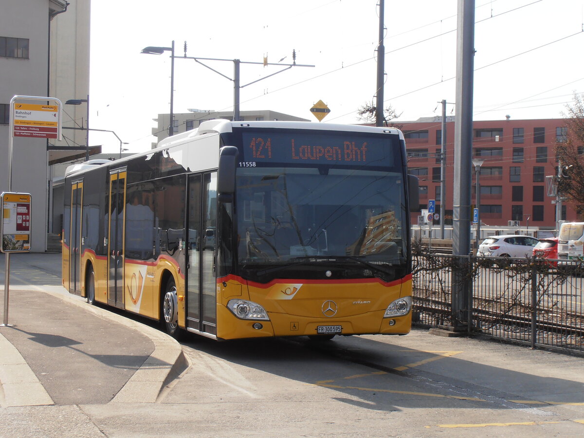 (233'838) - Wieland, Murten - Nr. 118/FR 300'595 - Mercedes am 12. Mrz 2022 beim Bahnhof Ddingen