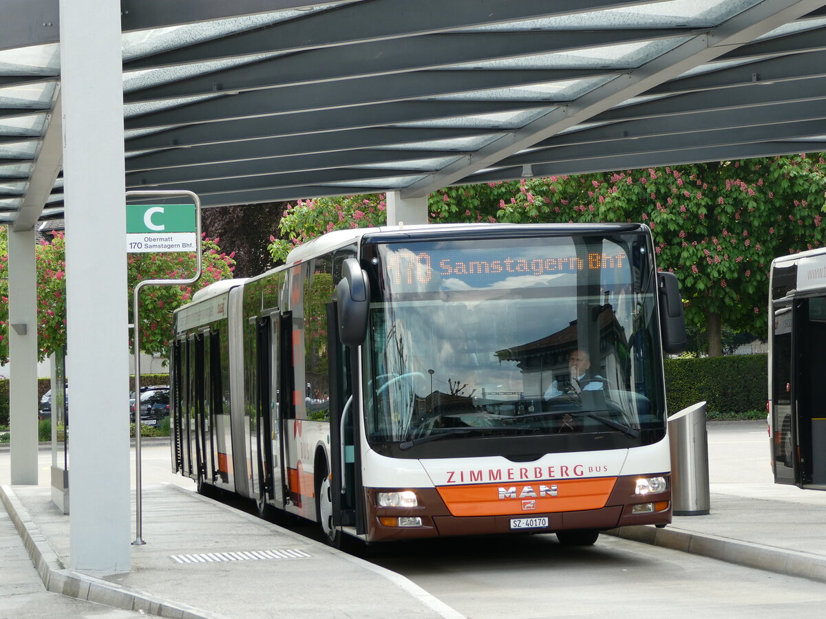 (235'157) - Bamert, Wollerau - SZ 40'170 - MAN am 4. Mai 2022 beim Bahnhof Richterswil