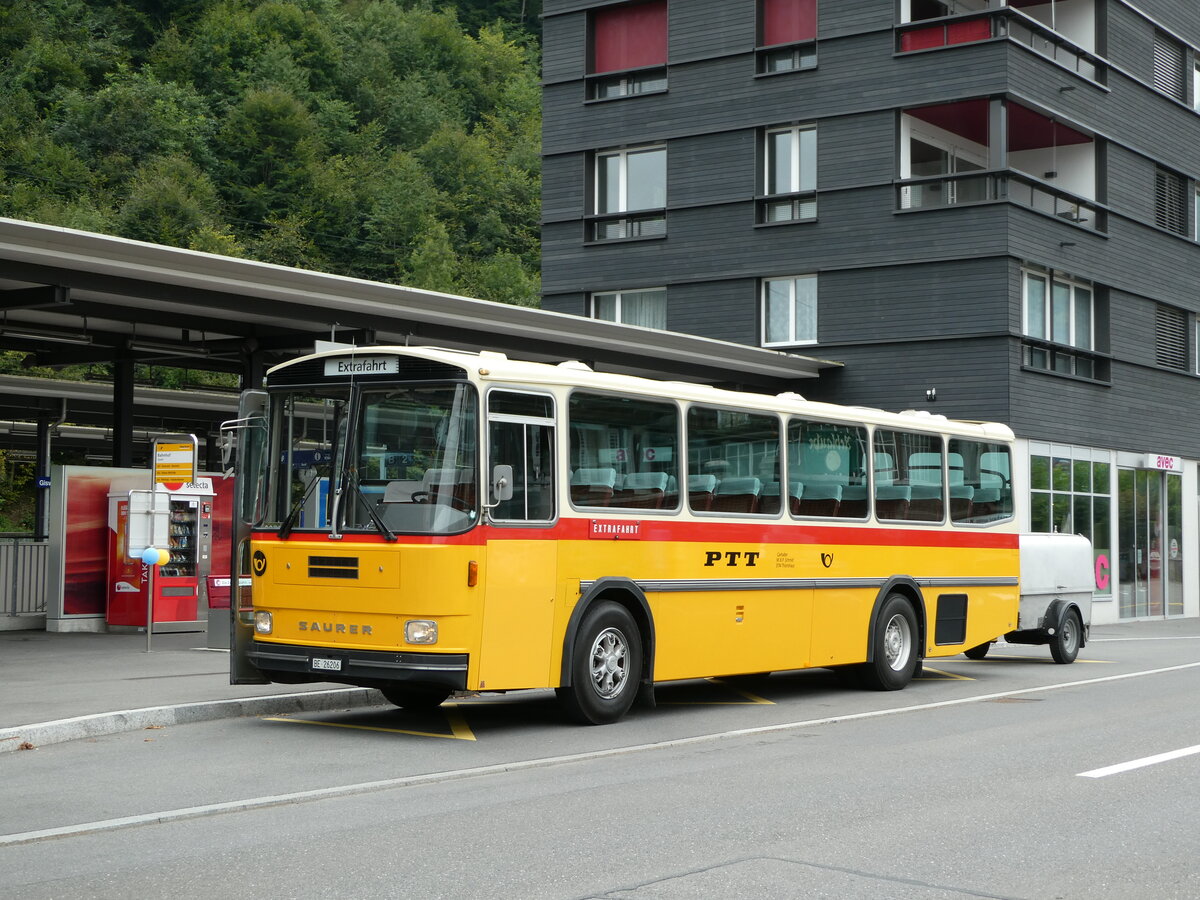 (239'810) - Schmid, Thrishaus - BE 26'206 - Saurer/Tscher (ex P 24'244) am 28. August 2022 beim Bahnhof Giswil