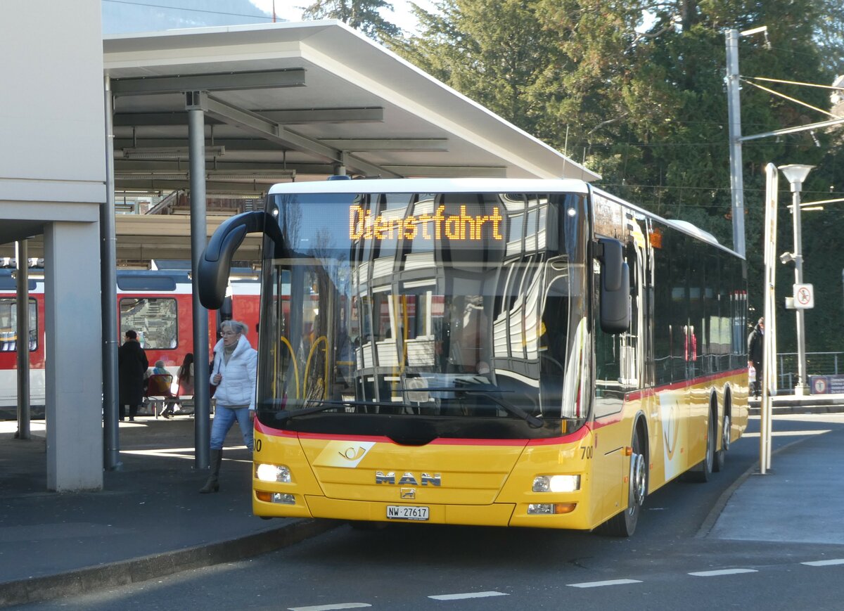 (246'158) - PostAuto Zentralschweiz - Nr. 700/NW 27'617/PID 5569 - MAN (ex Niederer, Filzbach Nr. 12; ex PostAuto Ostschweiz) am 16. Februar 2023 beim Bahnhof Stans