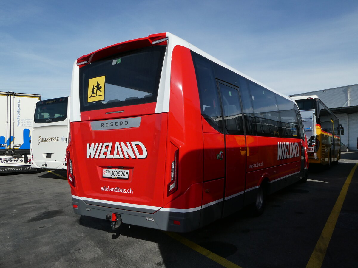 (246'323) - Wieland, Murten - Nr. 126/FR 300'590 - Iveco/Rosero am 18. Februar 2023 in Kerzers, Interbus