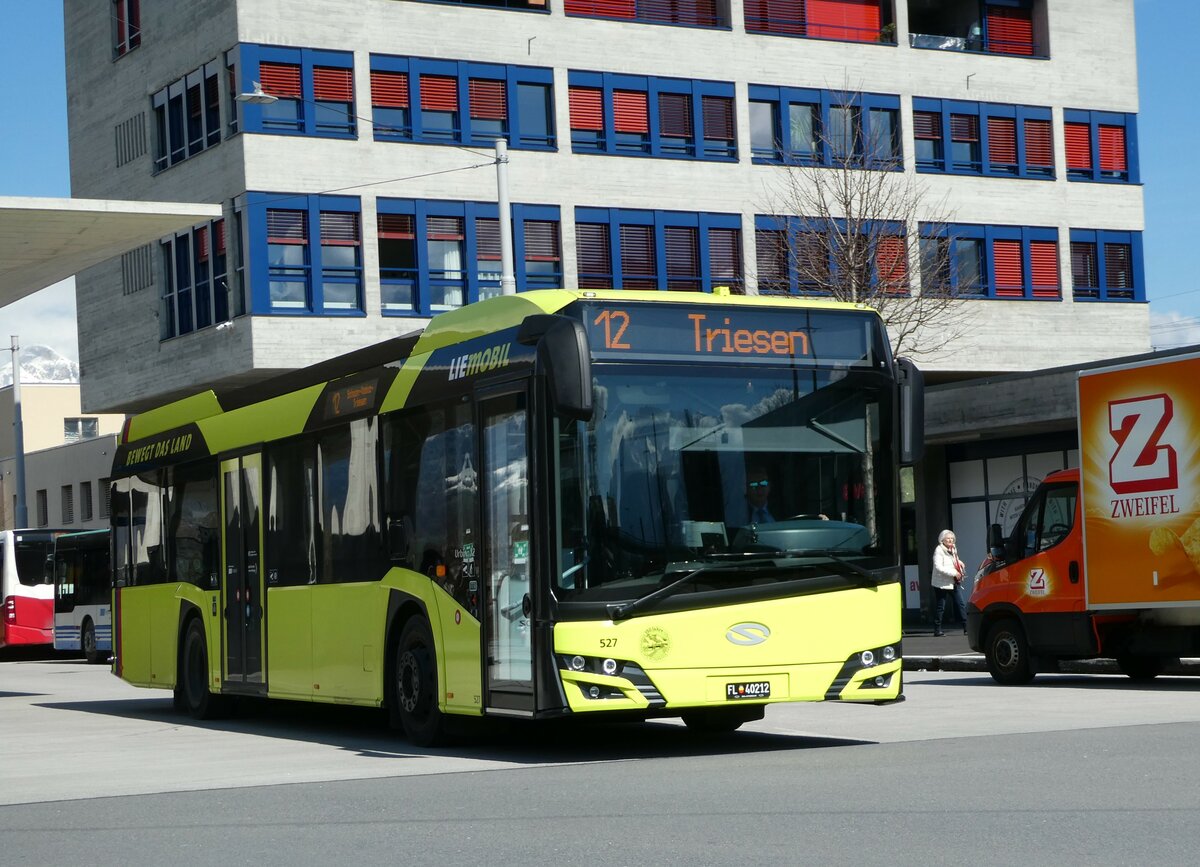 (247'779) - Aus Liechtenstein: BOS PS Anstalt, Vaduz - Nr. 527/FL 40'212 - Solaris am 28. Mrz 2023 beim Bahnhof Buchs