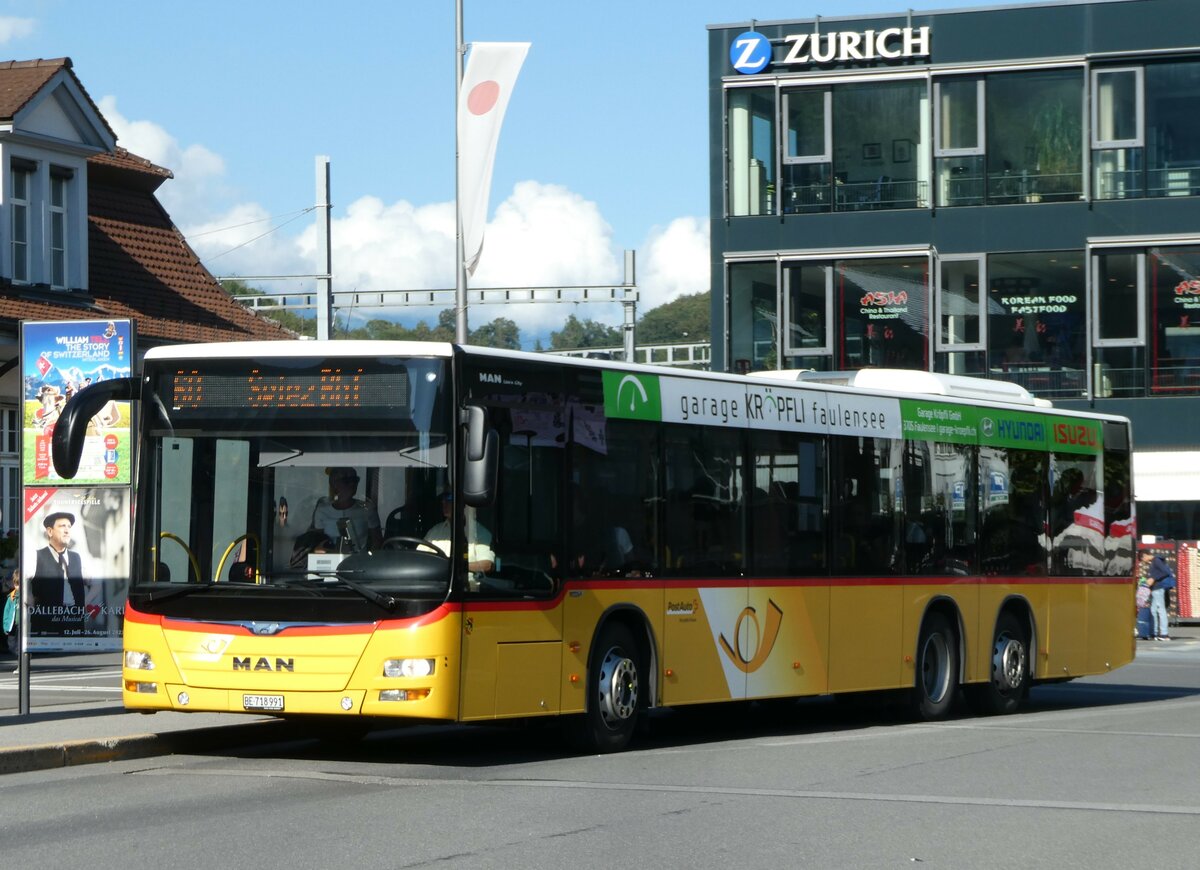 (253'430) - PostAuto Bern - BE 718'991/PID 10'526 - MAN am 5. August 2023 beim Bahnhof Interlaken Ost