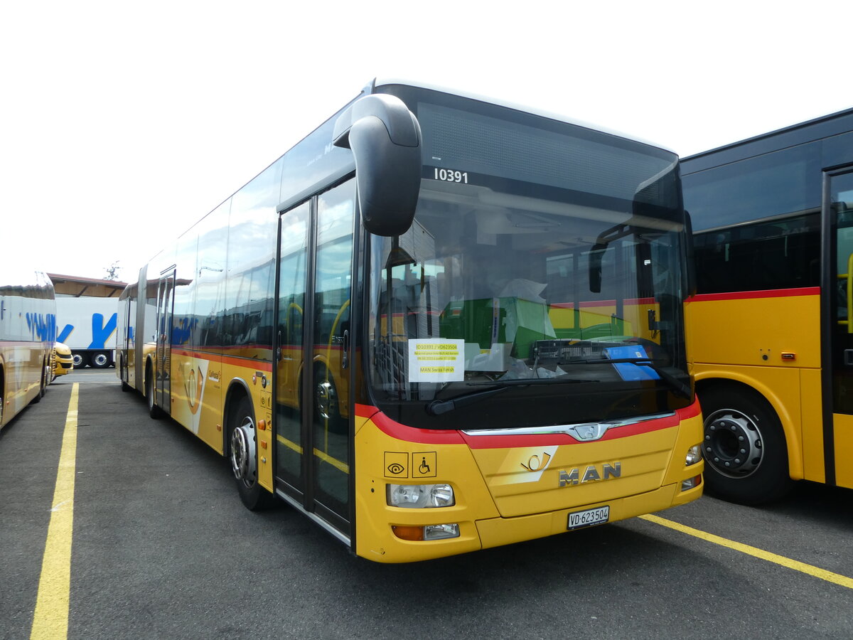 (253'785) - CarPostal Ouest - VD 623'504/PID 10'391 - MAN (ex JU 52'076; ex Nr. 38) am 13. August 2023 in Kerzers, Interbus