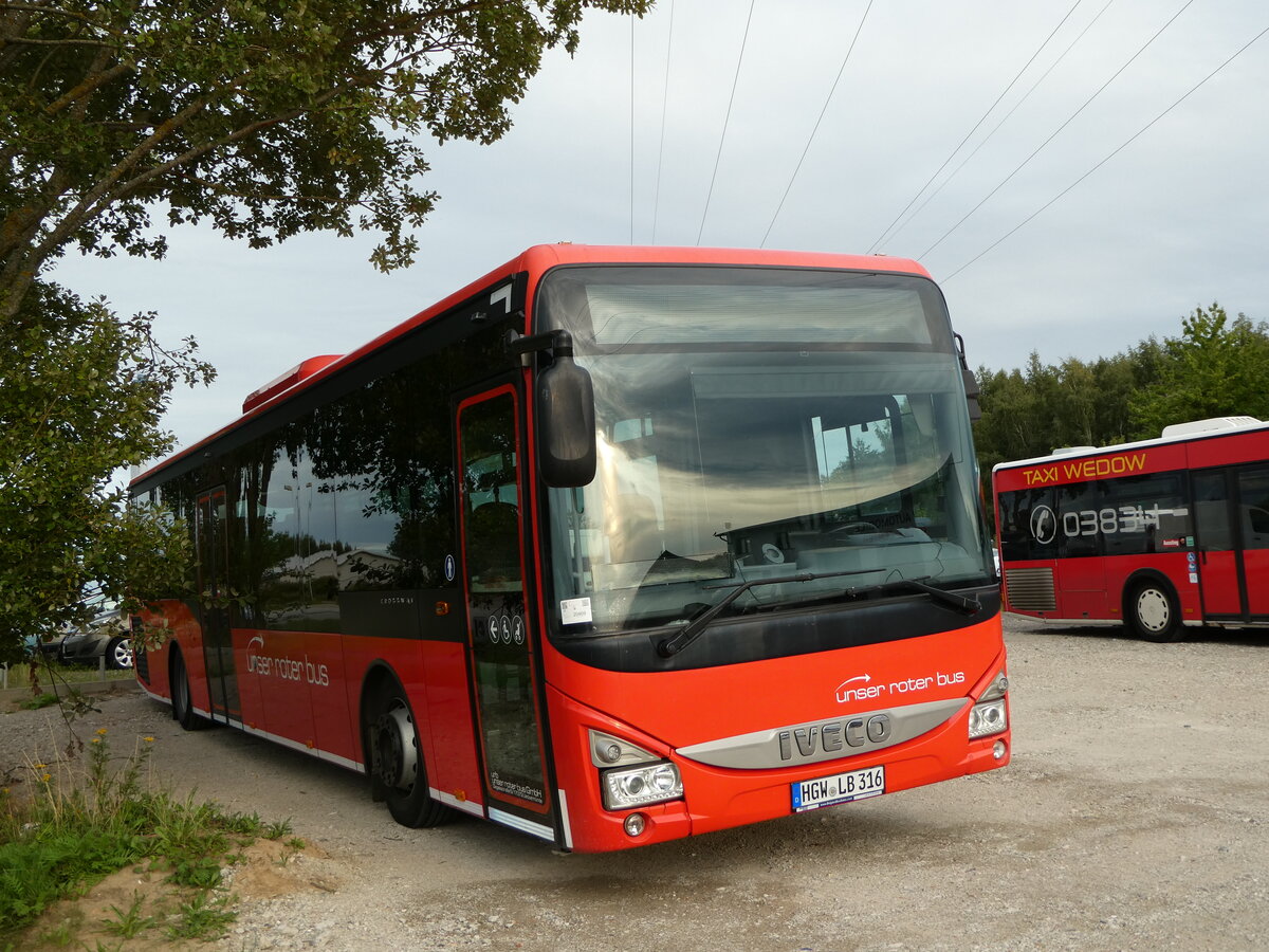 (254'401) - Unser Roter Bus, Ueckermnde - HGW-LB 316 - Iveco am 30. August 2023 in Greifswald, City Automobile