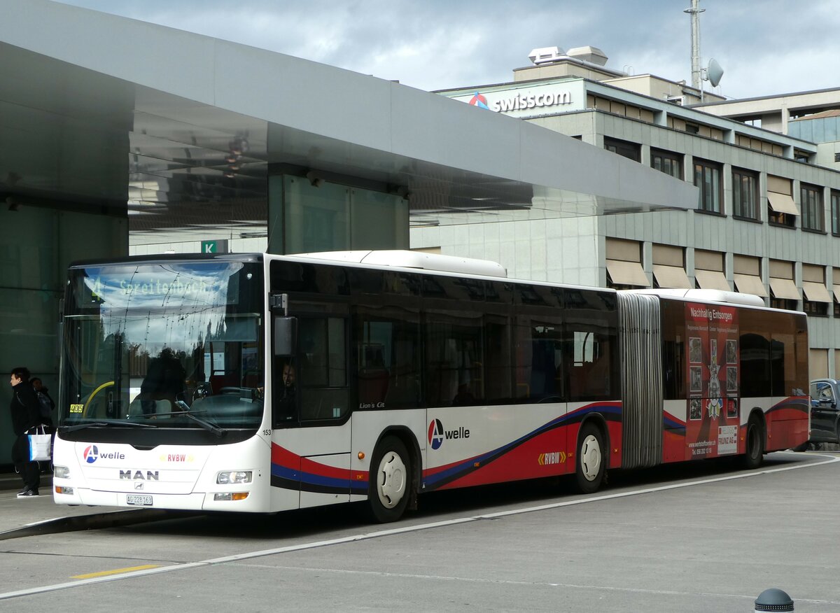 (256'732) - RVBW Wettingen - Nr. 153/AG 228'163 - MAN am 6. November 2023 beim Bahnhof Baden