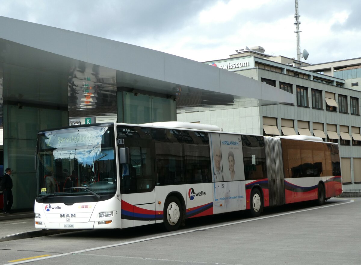 (256'738) - RVBW Wettingen - Nr. 167/AG 19'571 - MAN am 6. November 2023 beim Bahnhof Baden