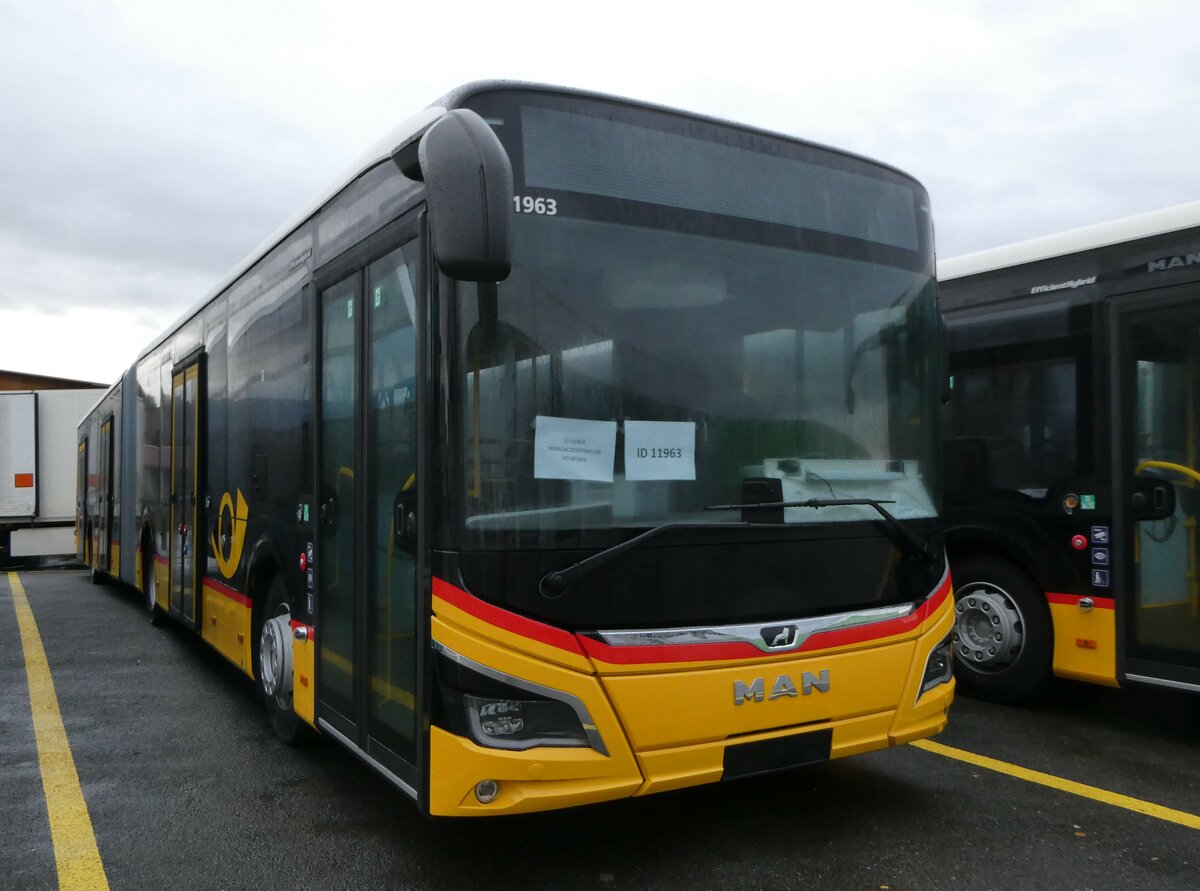 (257'169) - CarPostal Ouest - PID 11'963 - MAN am 19. November 2023 in Kerzers, Interbus