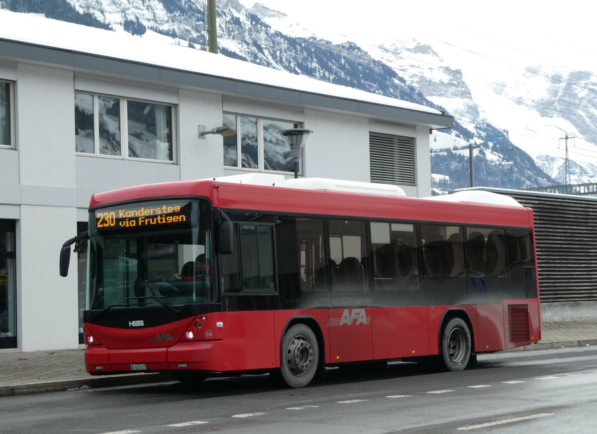 (257'264) - AFA Adelboden - Nr. 59/BE 645'415 - Scania/Hess am 27. November 2023 beim Bahnhof Frutigen