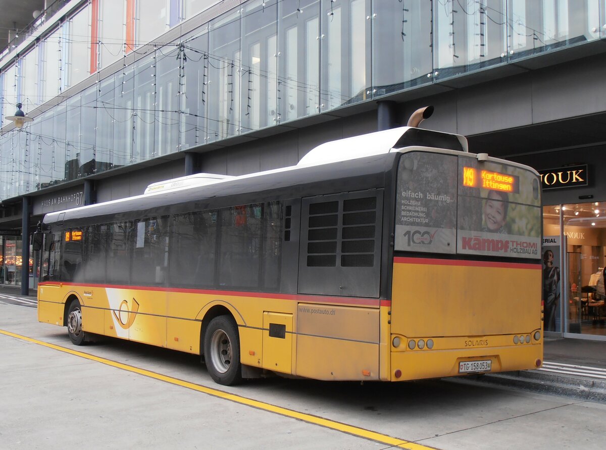 (257'647) - PostAuto Ostschweiz - TG 158'053/PID 10'079 - Solaris am 15. Dezember 2023 beim Bahnhof Frauenfeld