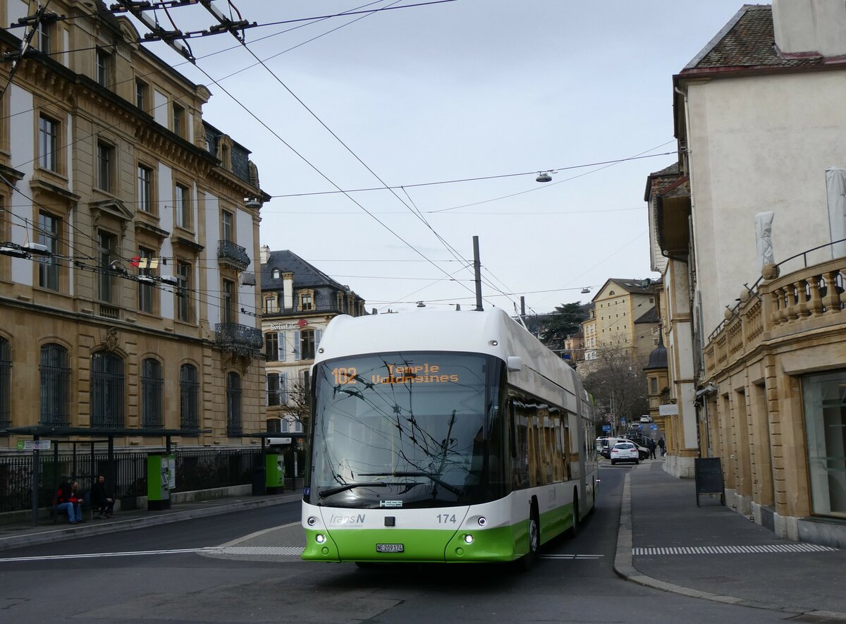 (258'919) - transN, La Chaux-de-Fonds - Nr. 174/NE 209'174 - Hess/Hess Gelenktrolleybus am 26. Januar 2024 in Neuchtel, Place Pury