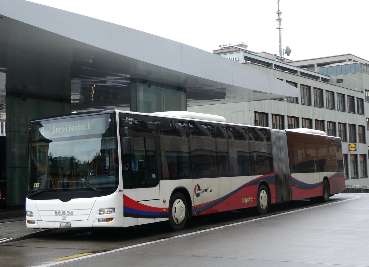 (260'736) - RVBW Wettingen - Nr. 159/AG 18'070 - MAN am 28. Mrz 2024 beim Bahnhof Baden