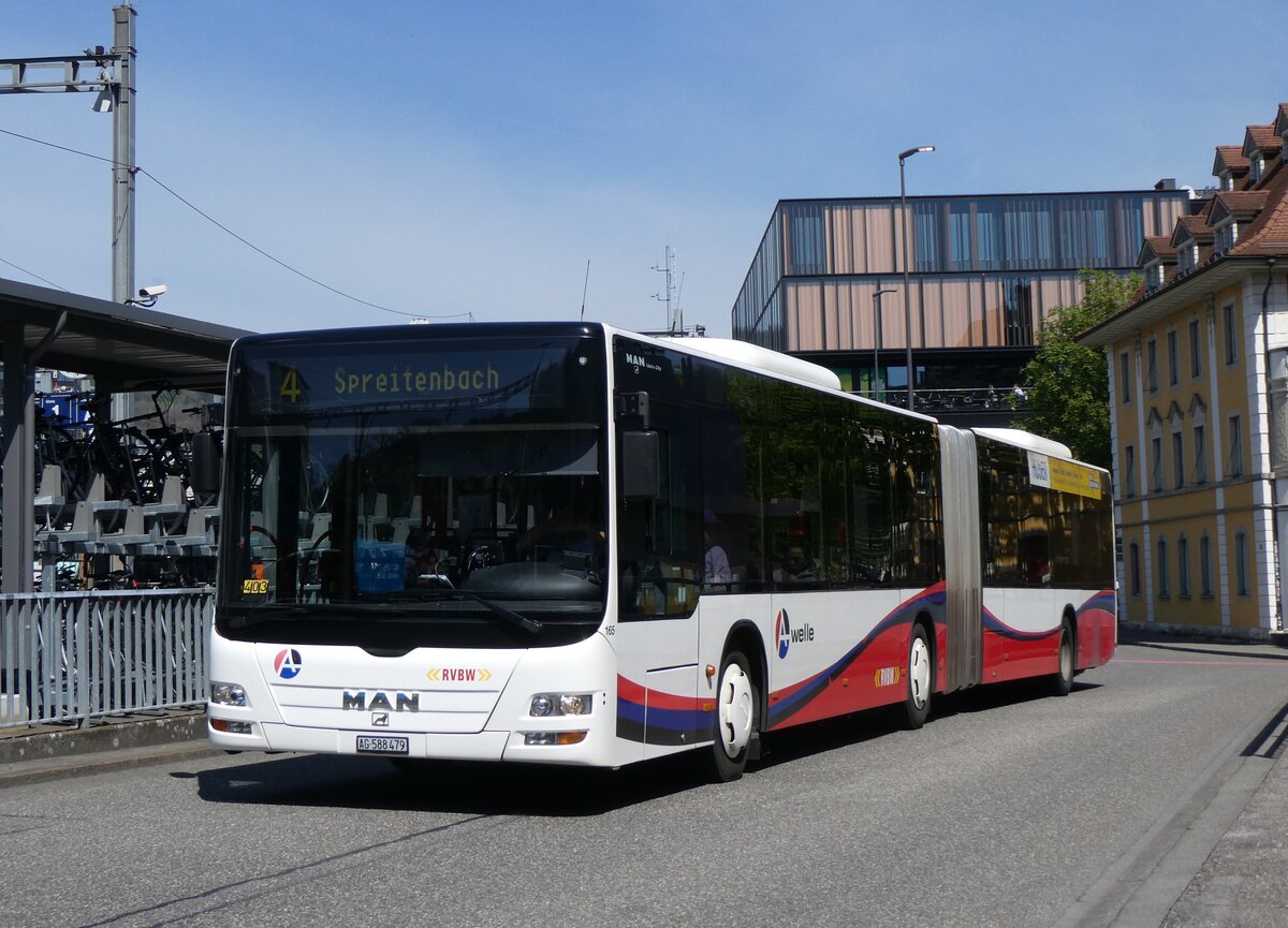 (261'184) - RVBW Wettingen - Nr. 165/AG 19'315 - MAN am 12. April 2024 beim Bahnhof Baden