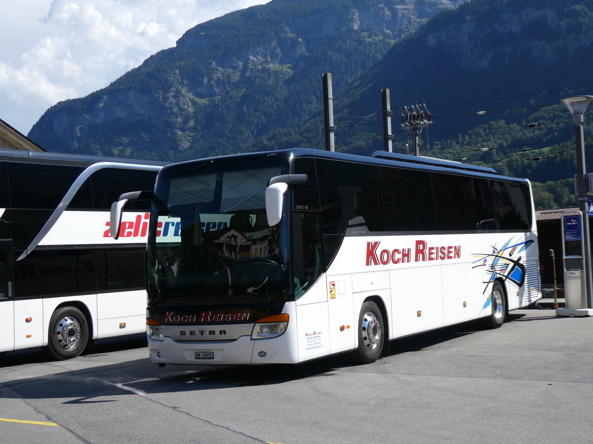 (265'636) - Koch, Giswil - OW 10'035 - Setra am 13. August 2024 beim Bahnhof Meiringen 