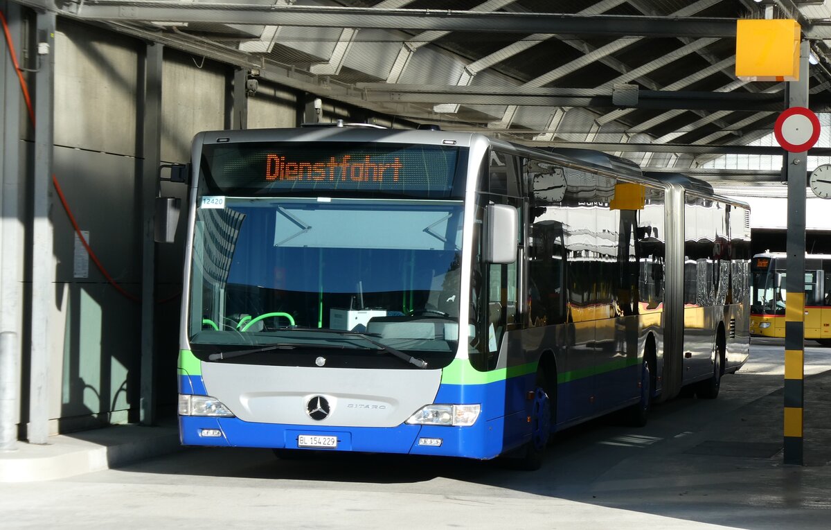 (281'044) - PostAuto Nordschweiz - BL 154'229/PID 12'420 - Mercedes (ex TPL Lugano Nr. 404) am 7. Oktober 2025 in Bern, Postautostation