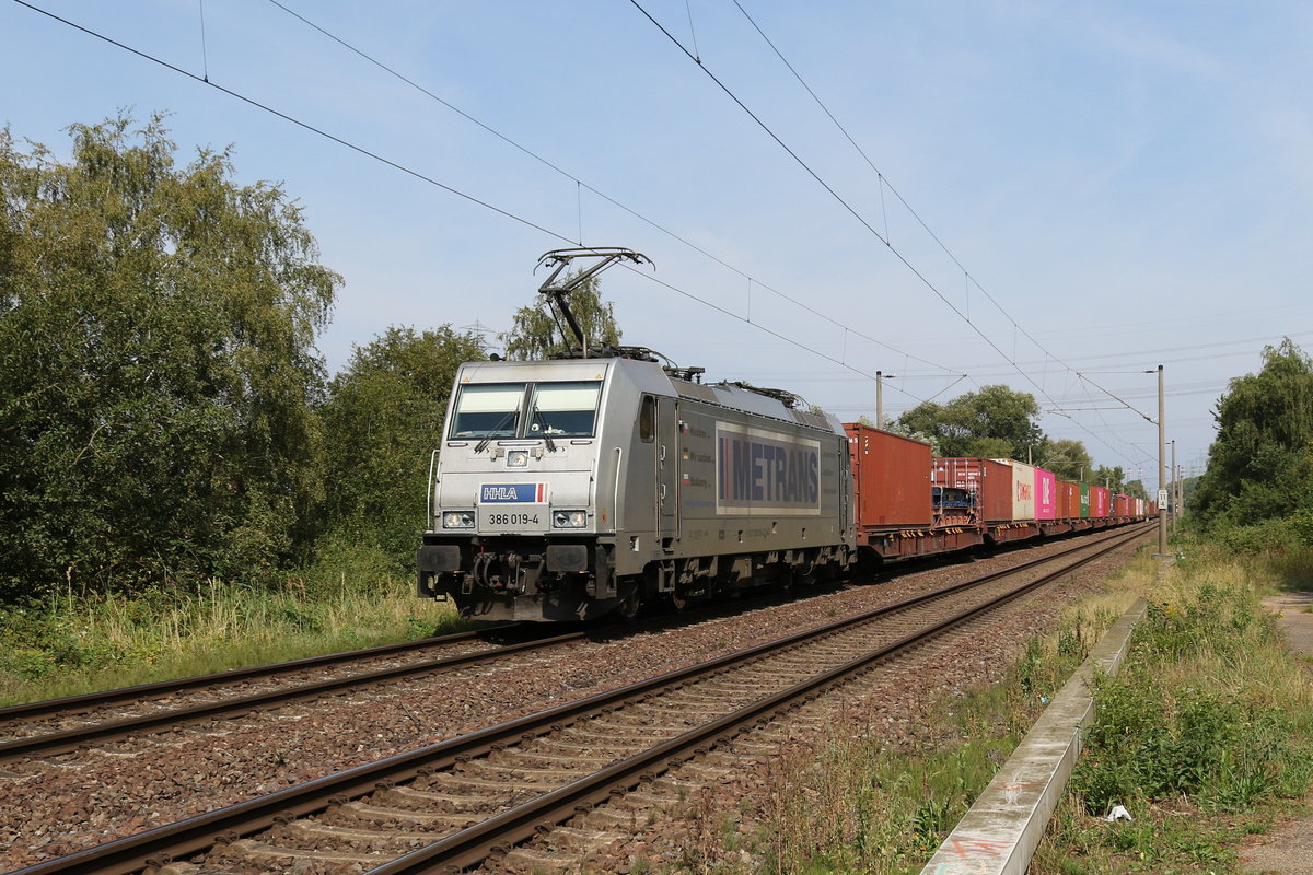 386 019 von  METRANS  aus Hamburg kommend am 330. August 2019 bei Hamburg-Moorburg.