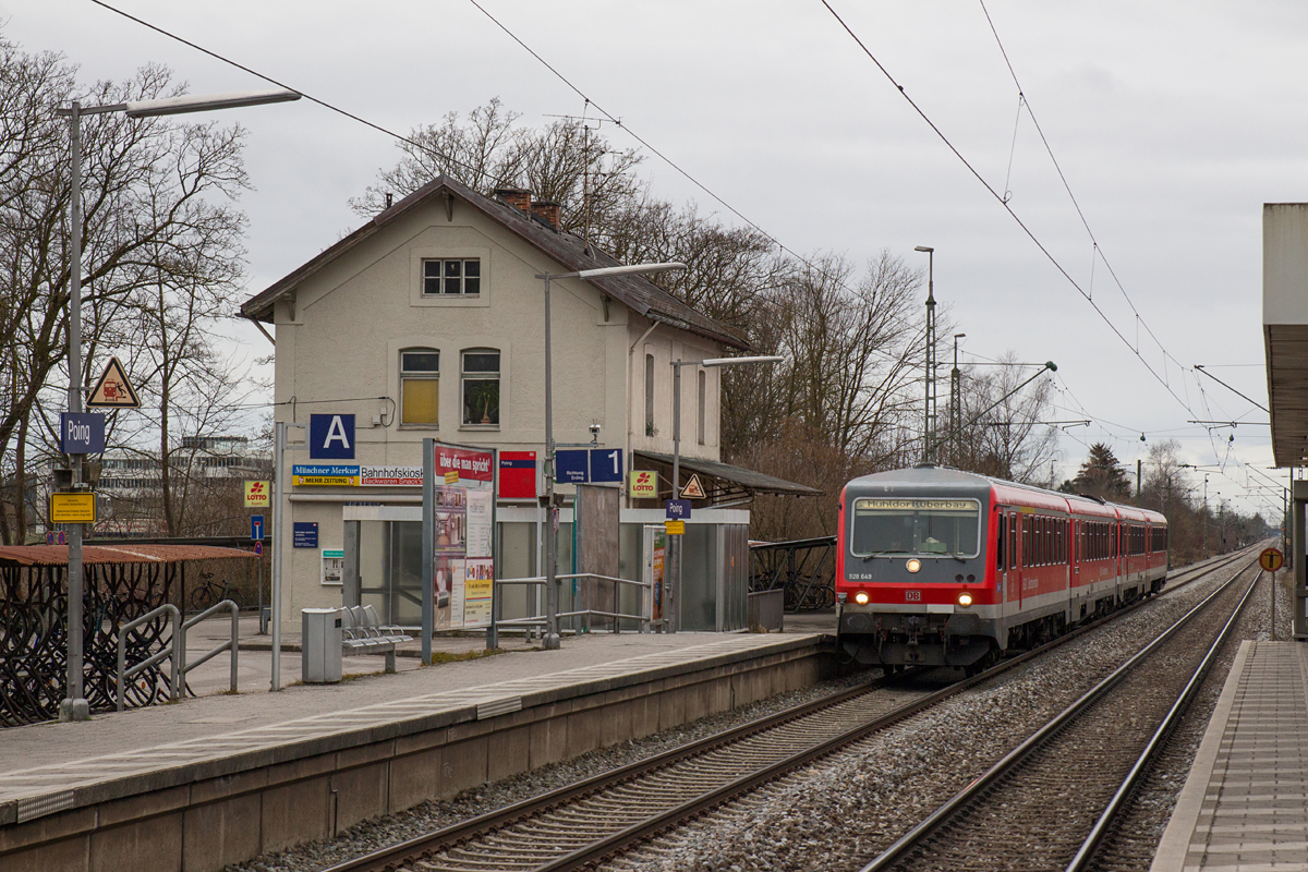 Am grauen Vormittag des 21.02.16 durchfährt der Mühldorfer 628 649-6 zusammen mit einem Schwesterfahrzeug von München Hbf kommend nach Mühldorf den Haltepunkt Poing.