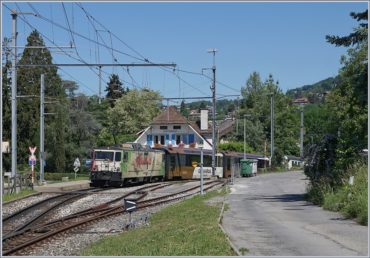 Die MOB GDe 4/4 6006 ist mit dem GoldenPass Panormamic nach Zweisimmen bei Fontanivent unterwegs. 

21. Mai 2020