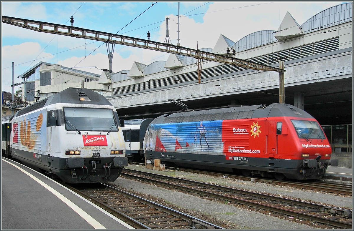 Gleich zwei Werbeloks: die Re 460 021-9  Kambly  und die  Tourisme Suisse  in Lausanne. 
27. April 20006 