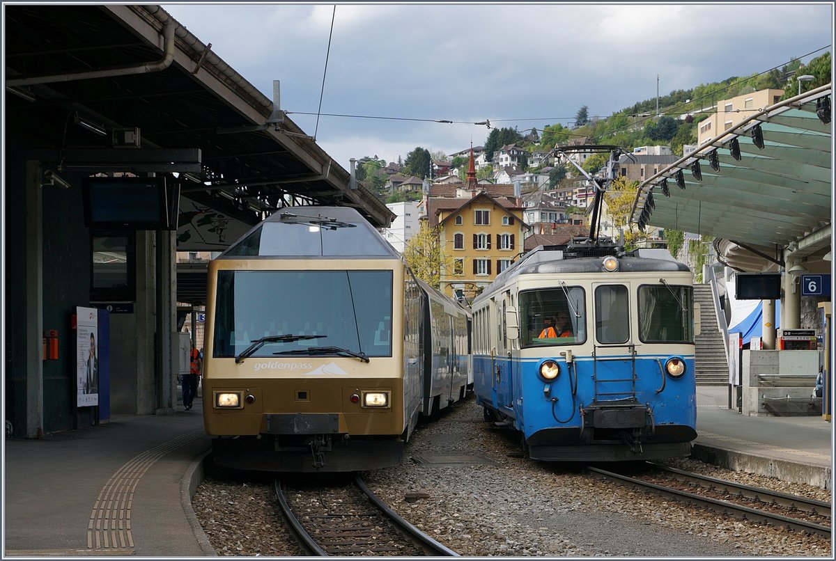 Markante Gesichter der MOB:  VIP  Panoramic-Steuerwagen (erste Bauart) und ABDe 8/8 in Montreux.
17. April 2017