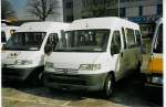 (084'001) - CarPostal Vaud-Fribourg - Peugeot am 19.