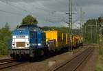 V 100-SP-010 oder 203 146-6(ex DR 202 847)als Zuglok des Spitzke Bauzuges der berraschend aus Richtung Flensburg durch Schleswig gefahren kam. 10.8.11