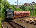 Locon 217/203 123-5(ex DR 202 376)mit Schotterwagenzug bei der Durchfahrt in Schleswig. 08.06.12