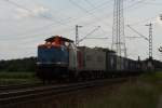 212 256-2 der Nordbayerischen Eisenbahn mit einem Containerzug in Wiesental am 04.08.2010